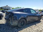 2024 Tesla Model Y Gray vin: 7SAYGAEEXRF077047