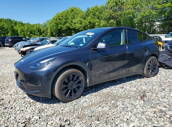 7SAYGAEEXRF077047 2024 TESLA MODEL Gray Առջևի ձախ երեք քառորդ տեսարան