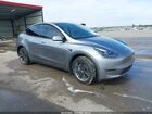 2024 Tesla Model Y Long Range Dual Motor All-wheel Drive Серый vin: 7SAYGAEEXRF210311