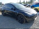 2025 Tesla Model Y Long Range Dual Motor All-wheel Drive Black vin: 7SAYGAEEXSF278470