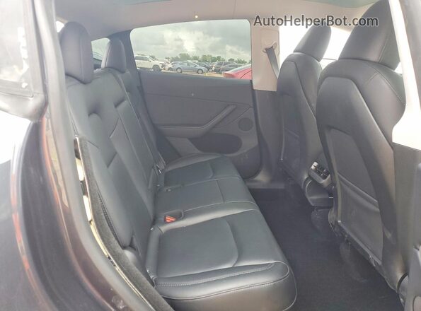 7SAYGDED0RA301528 2024 TESLA MODEL Charcoal Widok tylnych siedzeń