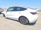 2025 Tesla Model Y White vin: 7SAYGDED0SF228833