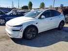 2026 Tesla Y White vin: 7SAYGDED0TF411649