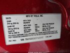 2026 Tesla Model Y Red vin: 7SAYGDED0TF426491