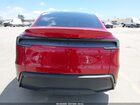 2026 Tesla Model Y Red vin: 7SAYGDED0TF426491
