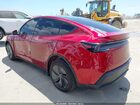 2026 Tesla Model Y Red vin: 7SAYGDED0TF426491
