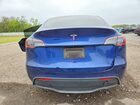 2024 Tesla Model Y Blue vin: 7SAYGDED1RA333405