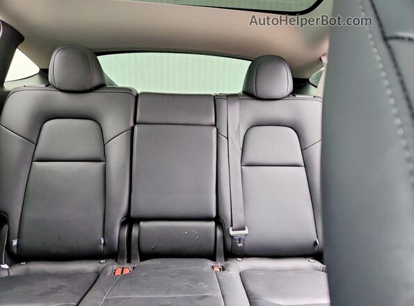 7SAYGDED1RA333405 2024 TESLA MODEL Blue Rear seats view