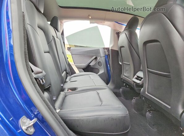 7SAYGDED1RA333405 2024 TESLA MODEL Blue Rear interior view