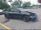 2024 Tesla Model Y Long Range Single Motor Rear-wheel Drive/rwd Серый vin: 7SAYGDED1RF162285