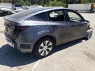 2023 Tesla Model Y Gray vin: 7SAYGDED2PF946424