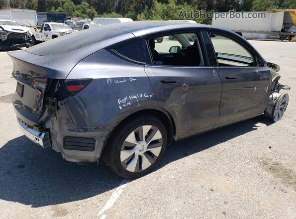 7SAYGDED2PF946424 2023 TESLA MODEL Gray Trasero derecho