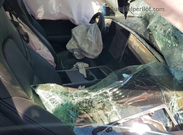 7SAYGDED2PF966690 2023 TESLA MODEL Blue Front interior view