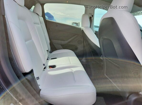 7SAYGDED2RA334658 2024 TESLA MODEL Gray Rear interior view