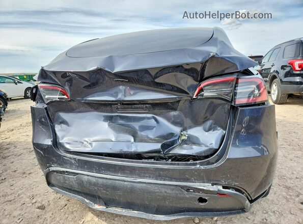 7SAYGDED2RA334658 2024 TESLA MODEL Gray Rear view