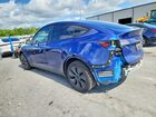 2024 Tesla Model Y Blue vin: 7SAYGDED2RF155667