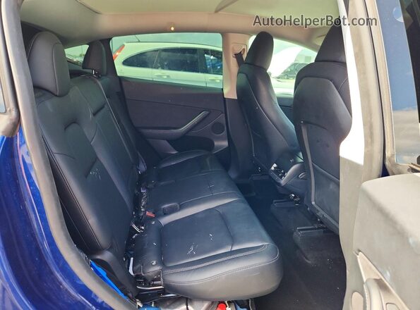 7SAYGDED2RF155667 2024 TESLA MODEL Blue Rear seats view