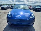 2024 Tesla Model Y Blue vin: 7SAYGDED2RF155667