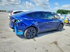 2024 Tesla Model Y Blue vin: 7SAYGDED2RF155667