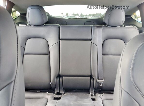 7SAYGDED2SF314063 2025 TESLA MODEL Black Rear seats view