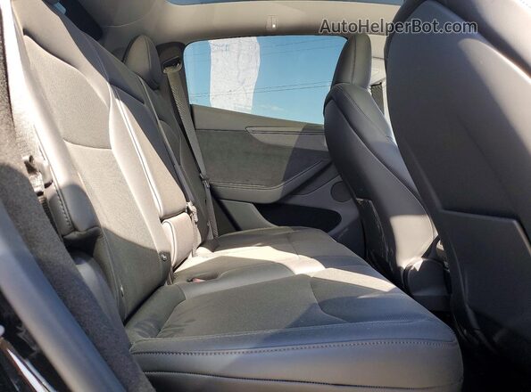 7SAYGDED2TA495633 2026 TESLA MODEL Black Rear seats view