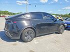 2026 Tesla Model Y Black vin: 7SAYGDED2TA495633