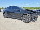 2026 Tesla Model Y Black vin: 7SAYGDED2TA495633