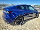 2026 Tesla Model Y Blue vin: 7SAYGDED2TF432387
