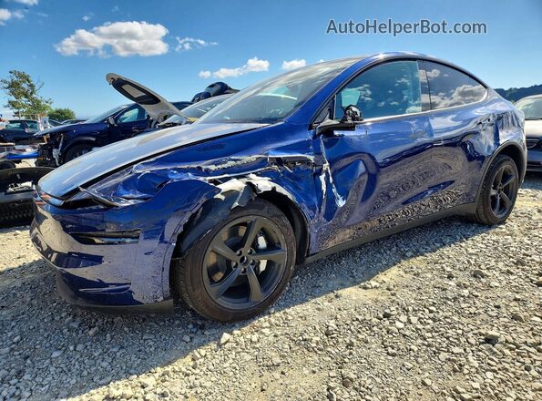 7SAYGDED2TF432387 2026 TESLA MODEL Blue Առջևի ձախ երեք քառորդ տեսարան