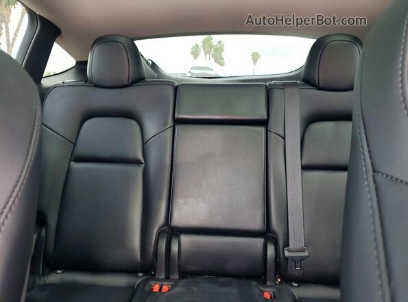 7SAYGDED3RF006121 2024 TESLA MODEL Red Rear seats view
