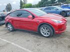 2024 Tesla Model Y Red vin: 7SAYGDED3RF006121