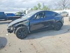 2024 Tesla Model Y Gray vin: 7SAYGDED4RF154410