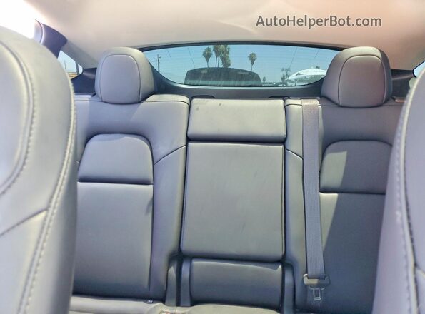 7SAYGDED5RF057684 2024 TESLA MODEL Gray Rear seats view