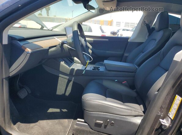 7SAYGDED5RF057684 2024 TESLA MODEL Gray Front interior view
