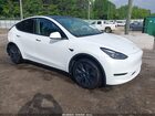 2025 Tesla Model Y Long Range Dual Motor Rear-wheel Drive White vin: 7SAYGDED5SA357860