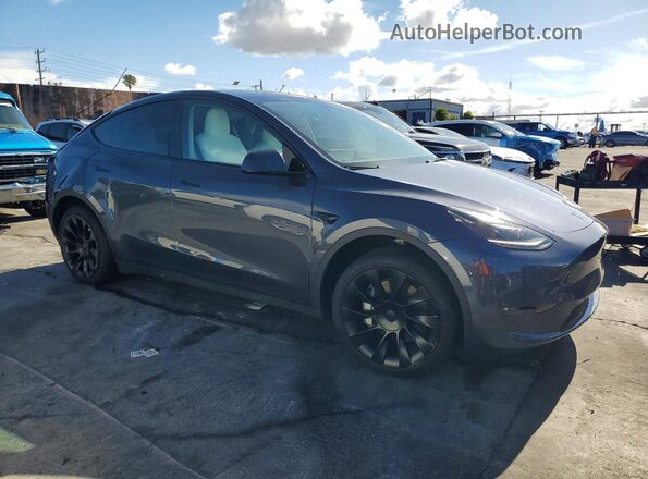7SAYGDED6PF956339 2023 TESLA MODEL Gray Front right