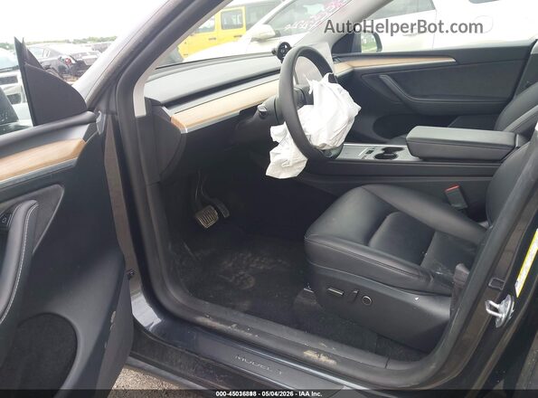 7SAYGDED6RA304238 2024 TESLA MODEL Y Gray წინა სალონის ხედი