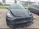 2024 Tesla Model Y Long Range Single Motor Rear-wheel Drive/rwd Gray vin: 7SAYGDED6RA304238
