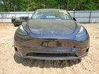2024 Tesla Model Y Gray vin: 7SAYGDED6RF042921