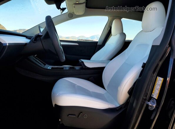 7SAYGDED6SF231266 2025 TESLA MODEL Gray Vista interior delantera
