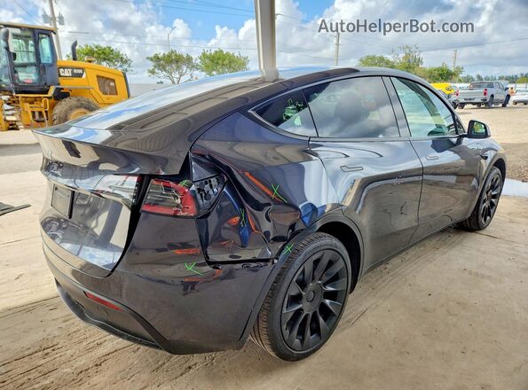 7SAYGDED7RA310758 2024 TESLA MODEL Charcoal Trasero derecho
