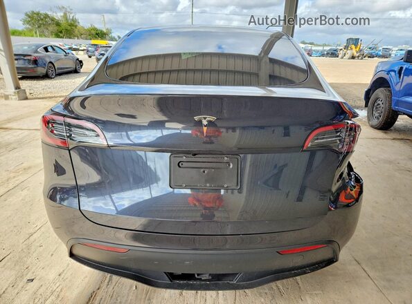 7SAYGDED7RA310758 2024 TESLA MODEL Charcoal Vista trasera