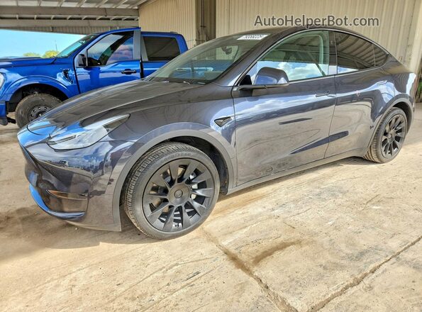 7SAYGDED7RA310758 2024 TESLA MODEL Charcoal Vista tres cuartos delantera izquierda