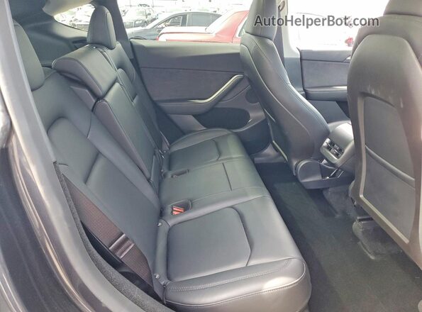 7SAYGDED7RF107114 2024 TESLA MODEL Серый Вид задней части салона