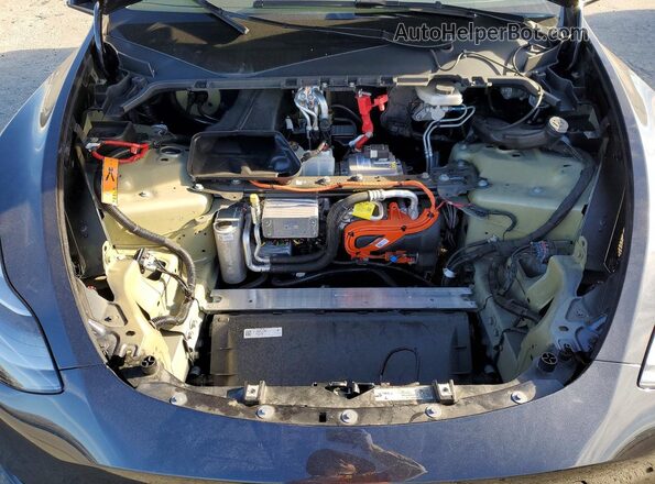 7SAYGDED8RF034349 2024 TESLA MODEL Gray Vista interior trasera