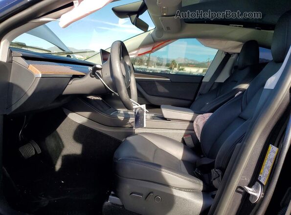 7SAYGDED8RF034349 2024 TESLA MODEL Gray Vista interior delantera