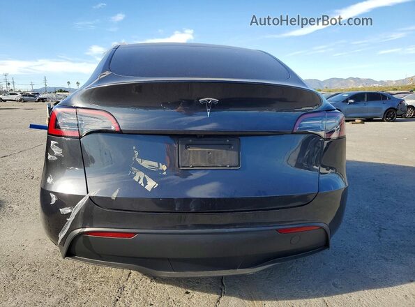 7SAYGDED8RF034349 2024 TESLA MODEL Gray Vista trasera