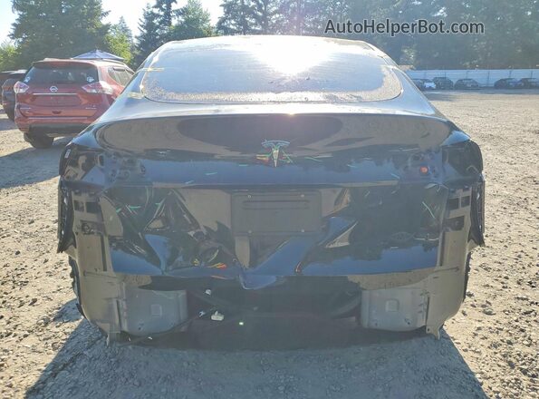 7SAYGDED8RF086063 2024 TESLA MODEL Black Rear view