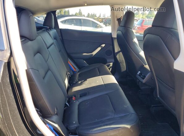 7SAYGDED8RF086063 2024 TESLA MODEL Black Rear seats view