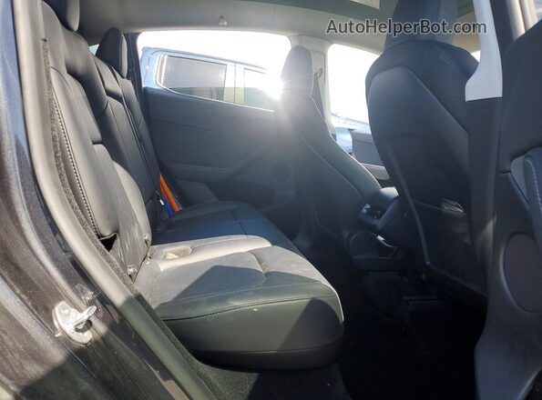 7SAYGDED8SF250532 2025 TESLA MODEL Угольный Вид задней части салона